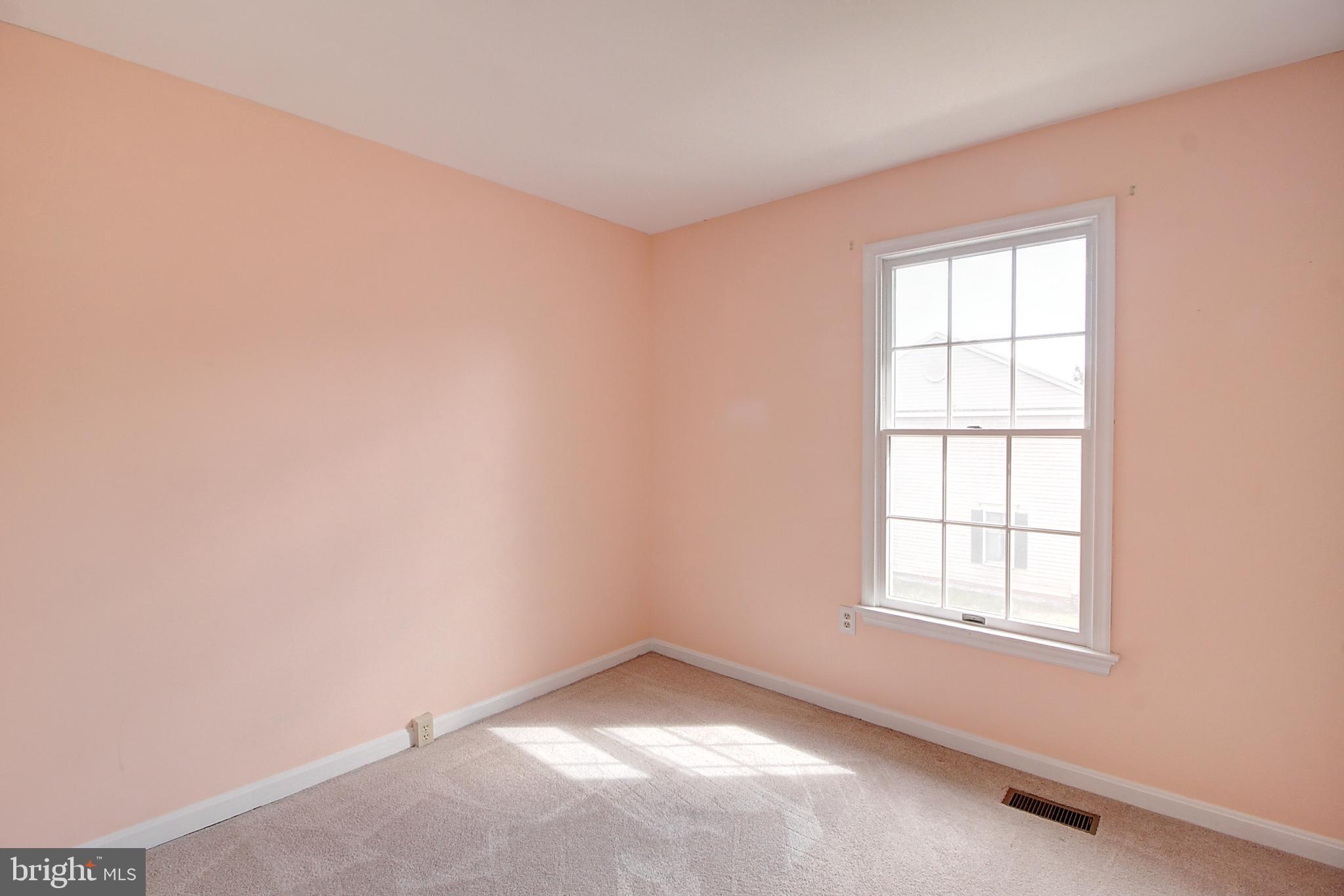 2415 Prentice Court Frederick, MD 21702 - Photo 13 of 20 an empty room with a window