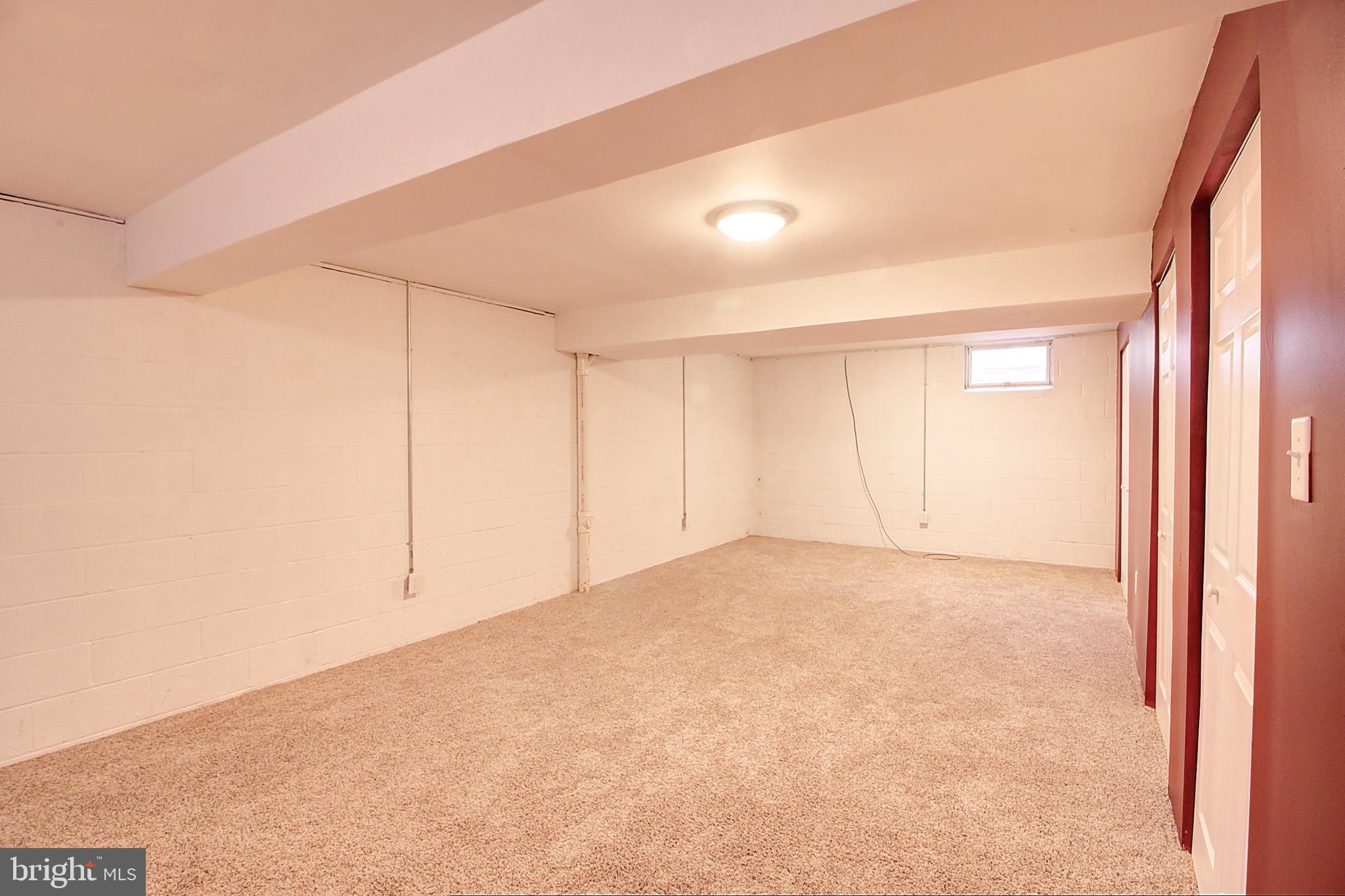 2415 Prentice Court Frederick, MD 21702 - Photo 16 of 20 a view of an empty room and a window