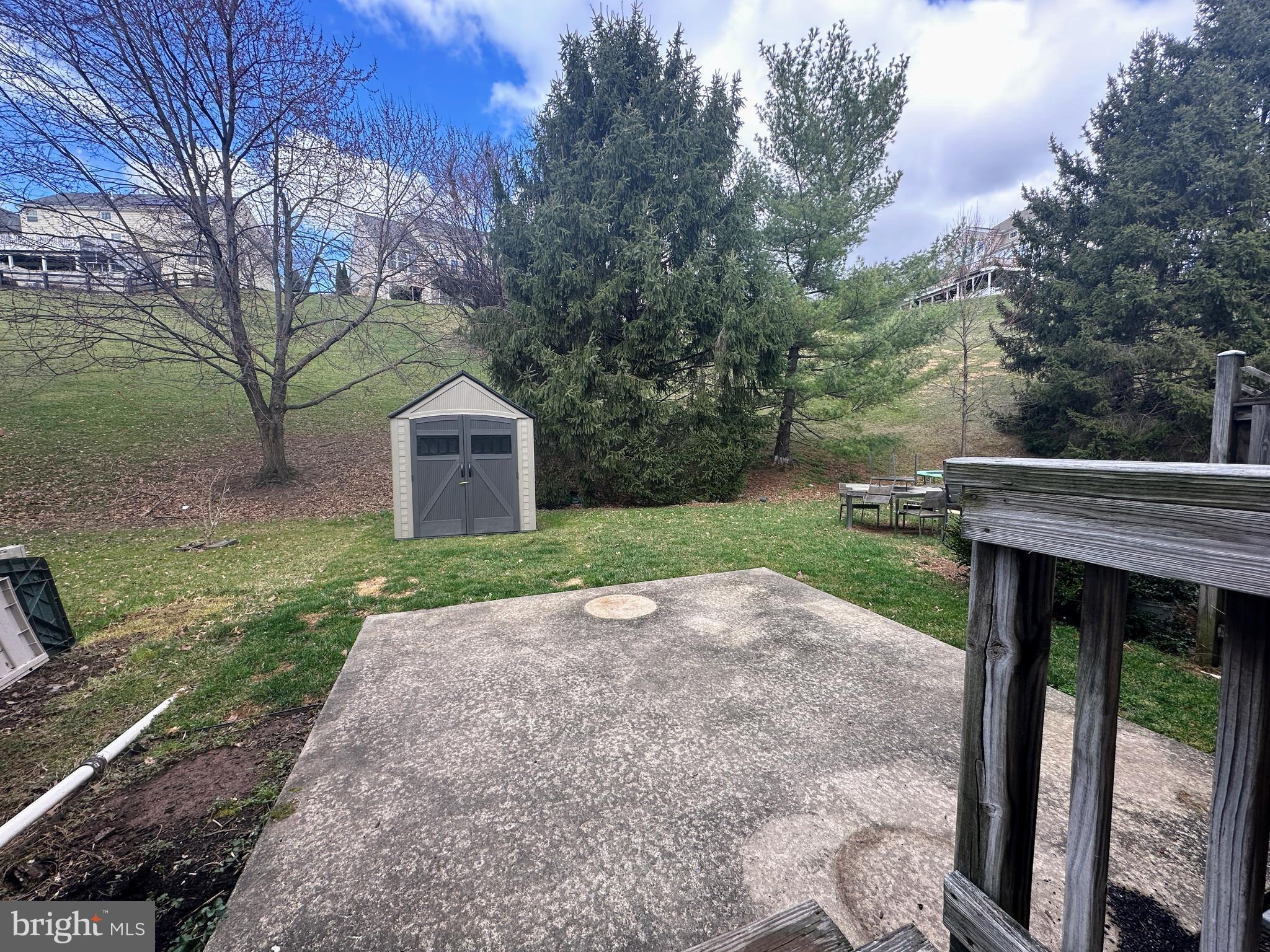 2415 Prentice Court Frederick, MD 21702 - Photo 2 of 20 a view of a house with backyard and trees