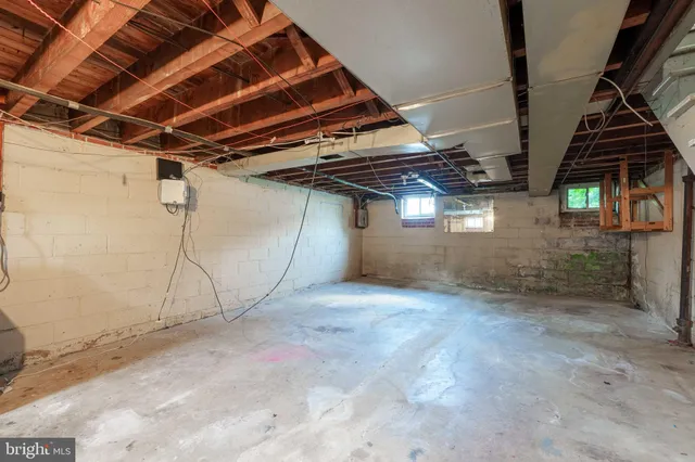 a view of a room with wooden walls