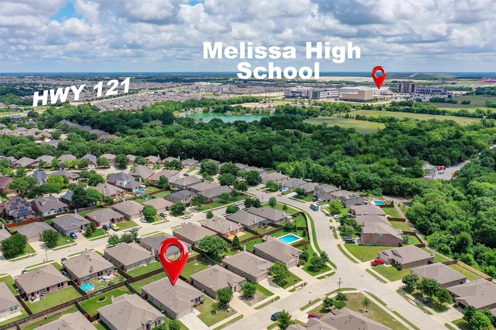 3011 Hickory Ridge Melissa, TX 75454 - Photo 28 of 30 Aerial perspective showcasing a residential neighborhood with single-story homes and mature trees