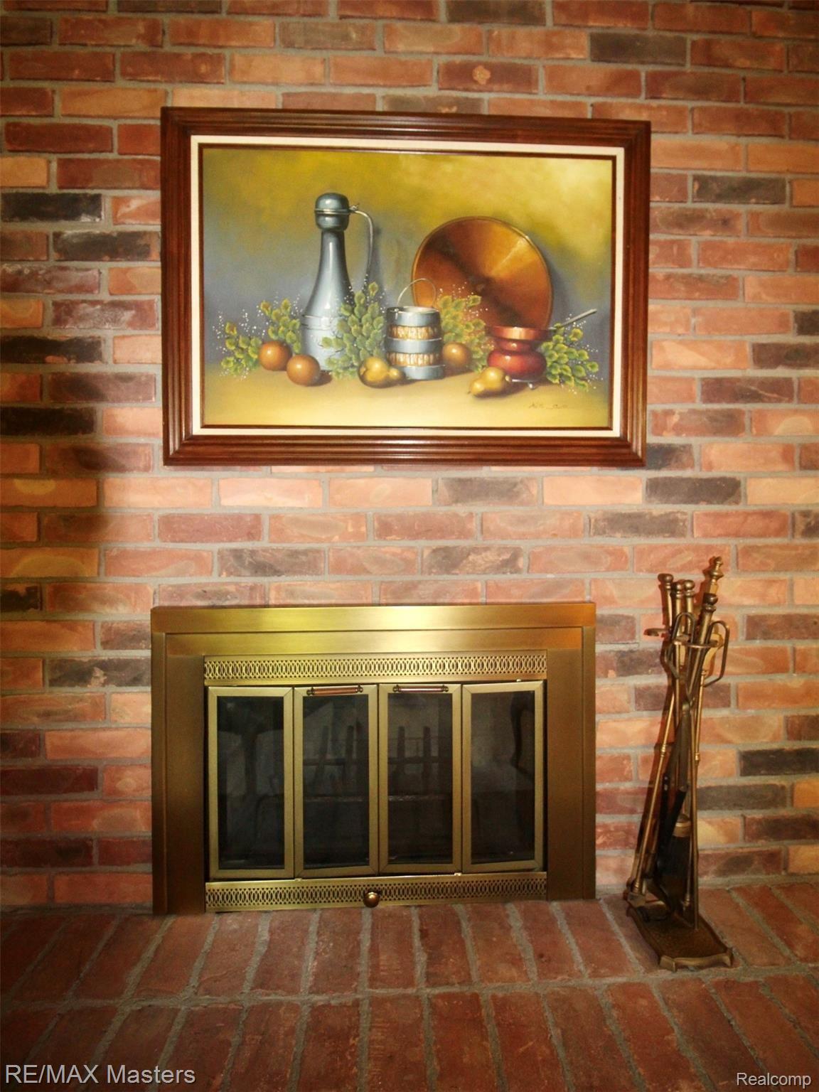 25777 Inkster Road Flat Rock, MI 48134 - Photo 7 of 52 Living Room fireplace is one of two fireplaces to enjoy