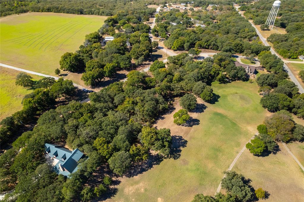 102 Comanche Trail Nocona, TX 76255 - Photo 15 of 26 a view of a lake with a yard