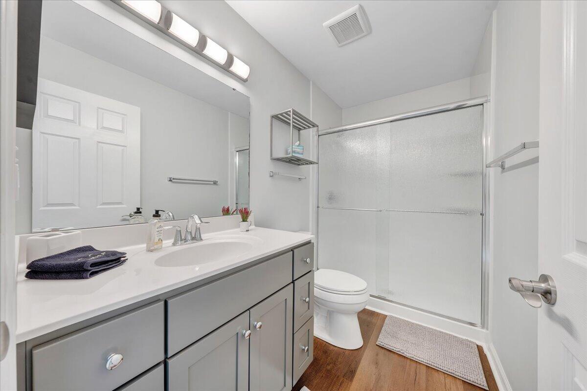 506 Harbor Ridge Drive Goodview, VA 24095 - Photo 22 of 39 a bathroom with a sink a toilet and shower
