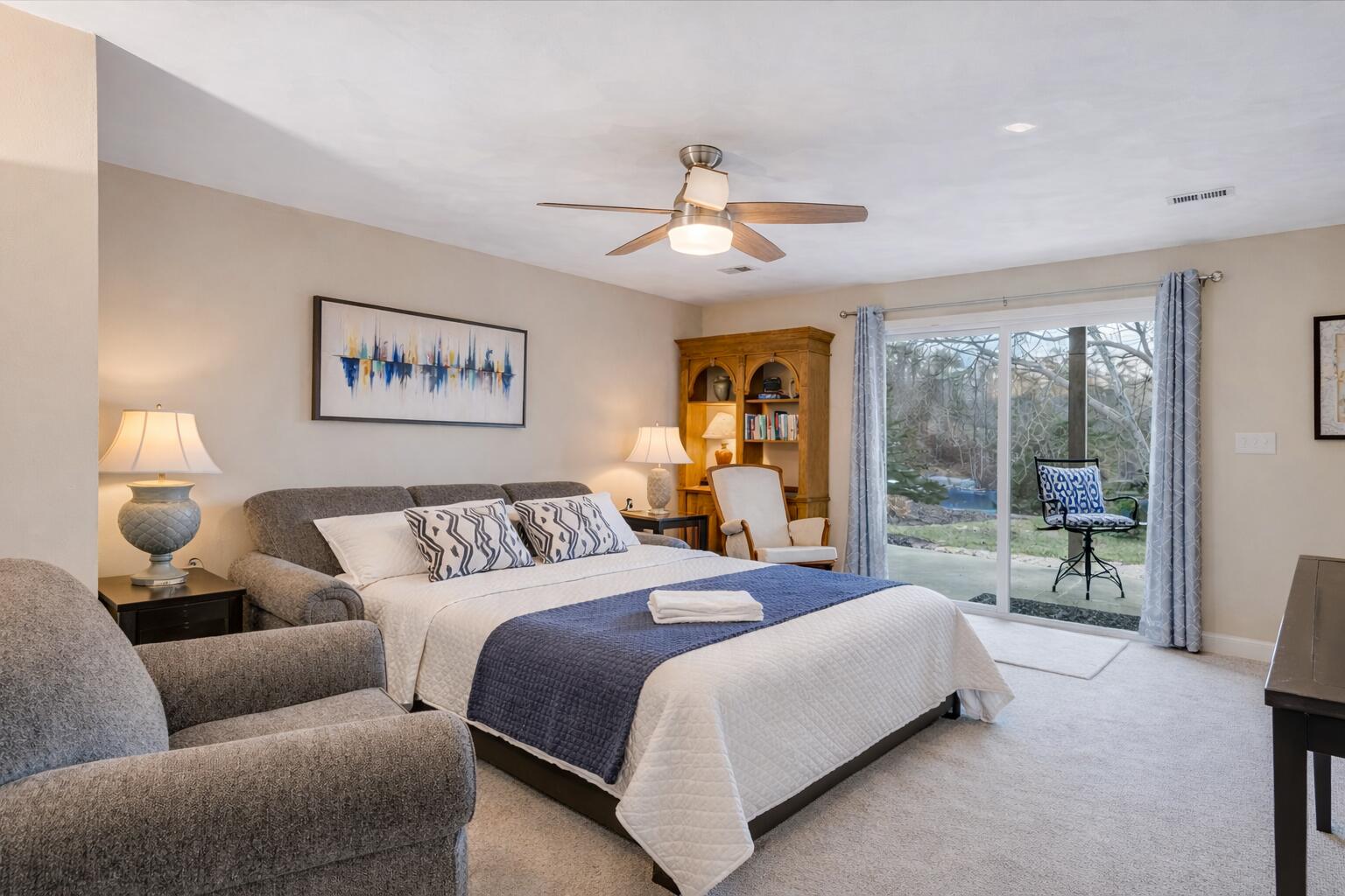 506 Harbor Ridge Drive Goodview, VA 24095 - Photo 27 of 39 a bedroom with a bed and a couch