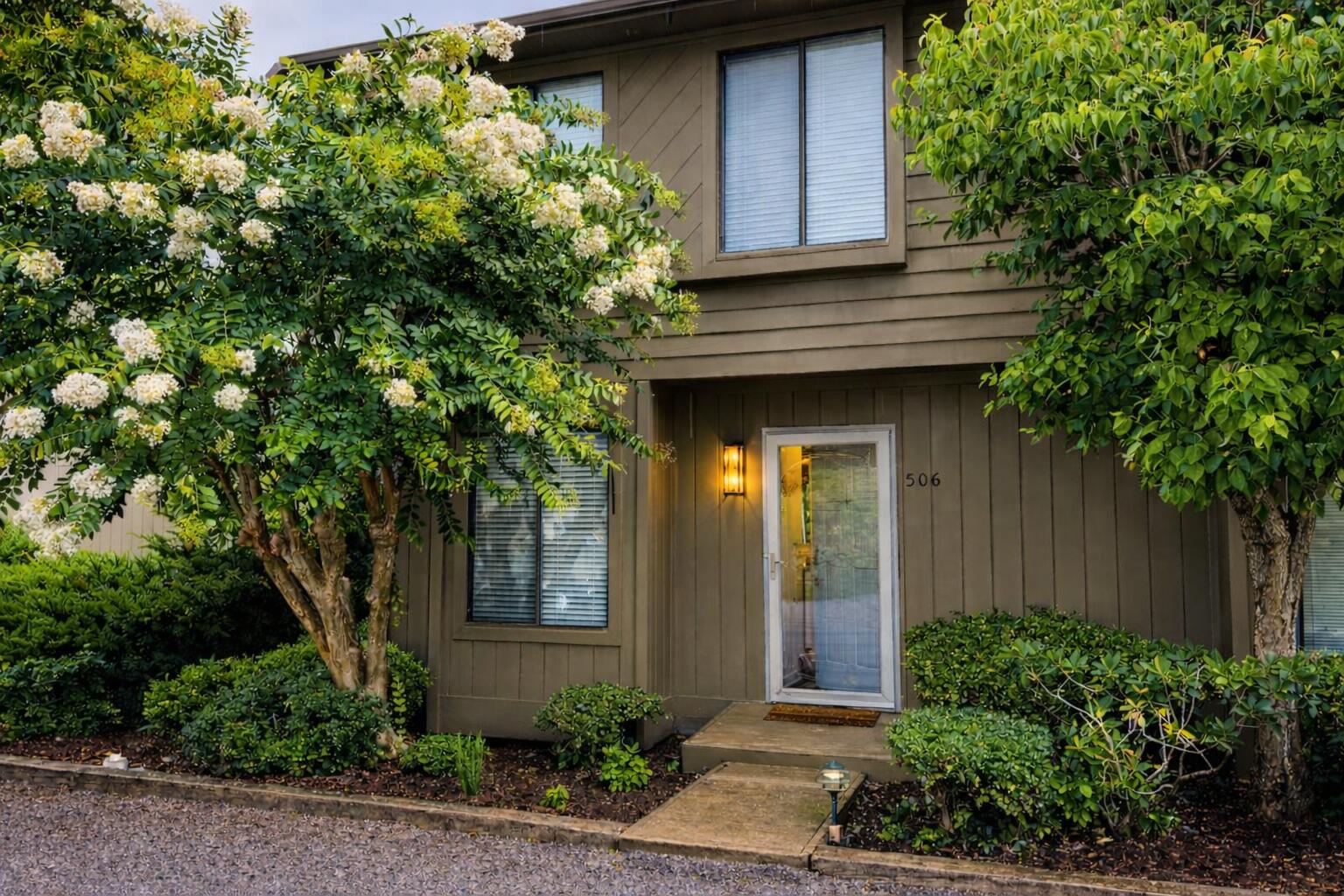 506 Harbor Ridge Drive Goodview, VA 24095 - Photo 3 of 39 a house with a tree in front of it