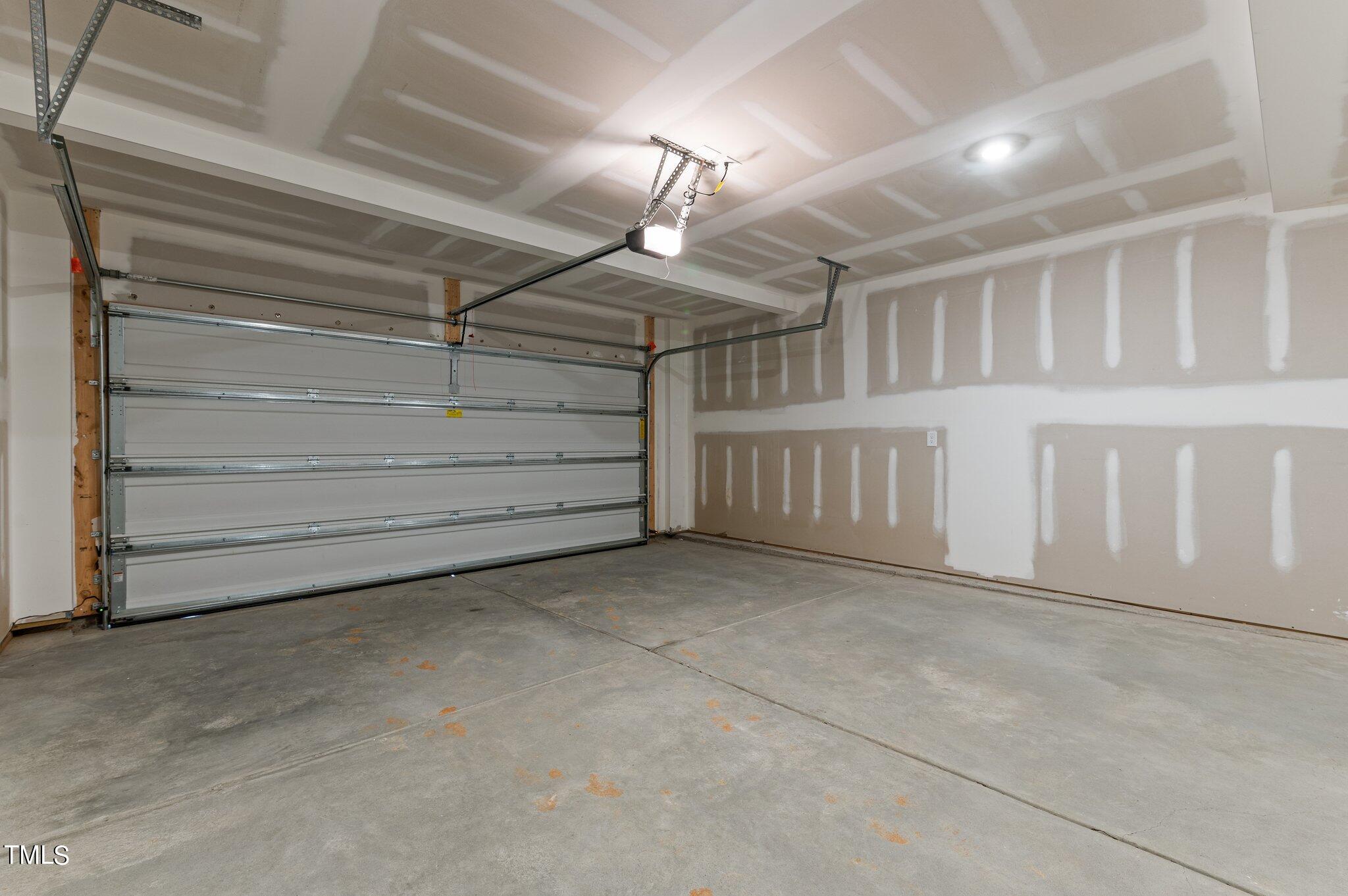 579 Forestville Road Wake Forest, NC 27587 - Photo 20 of 34 a view of an empty room with a staircase