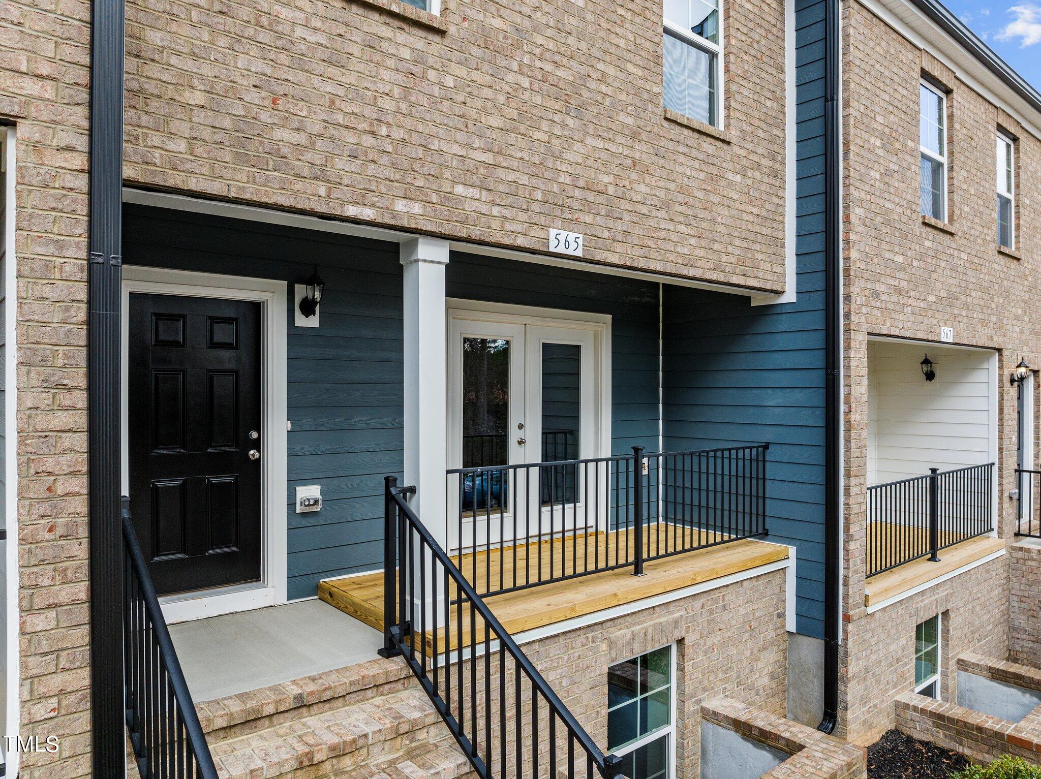 579 Forestville Road Wake Forest, NC 27587 - Photo 28 of 34 front view of a house with a balcony