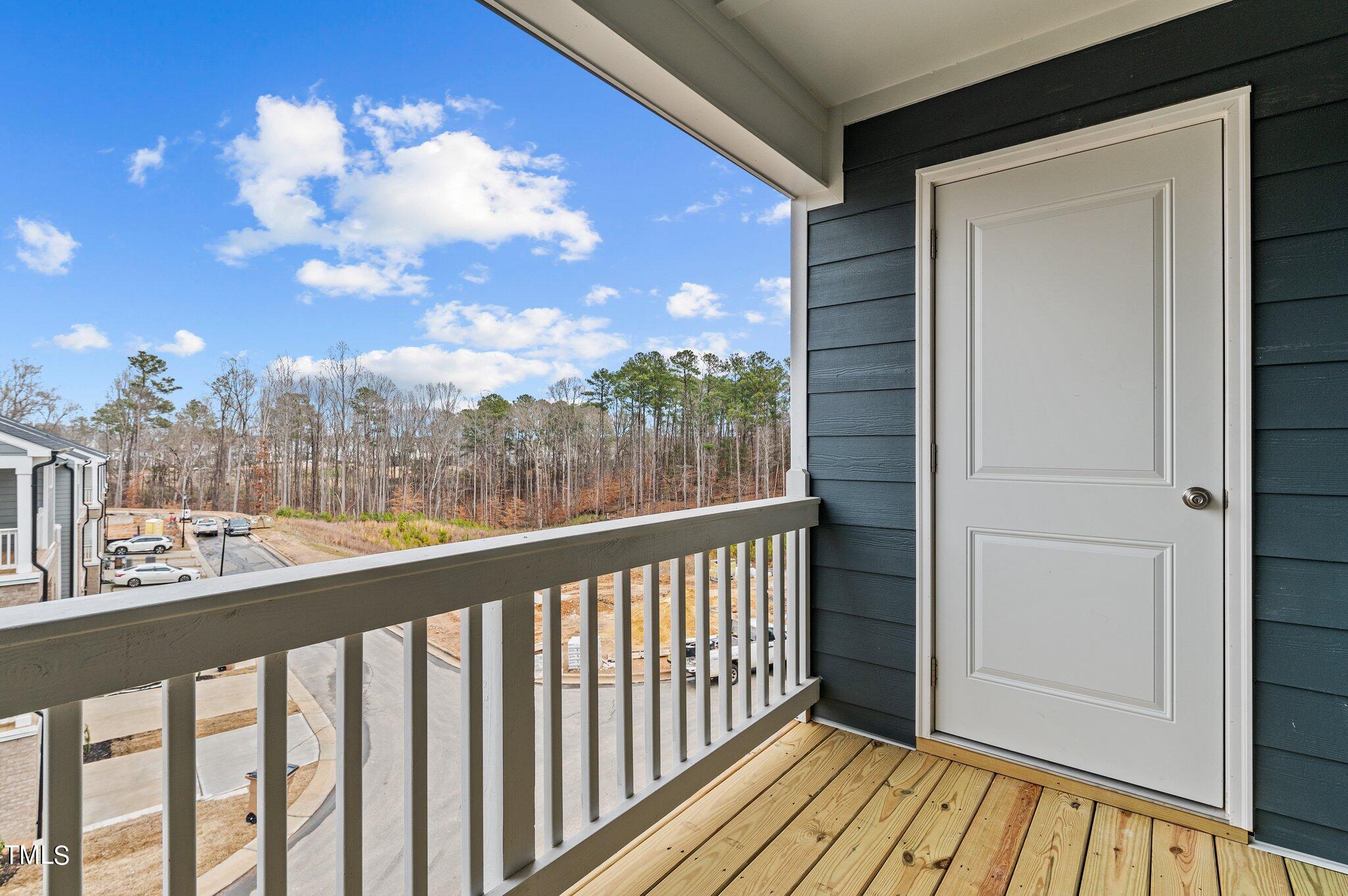 579 Forestville Road Wake Forest, NC 27587 - Photo 32 of 34 a view of city from a balcony