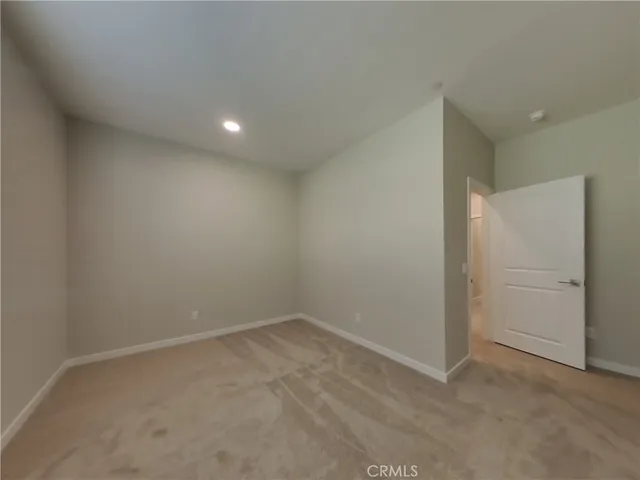 an empty room with an entryway