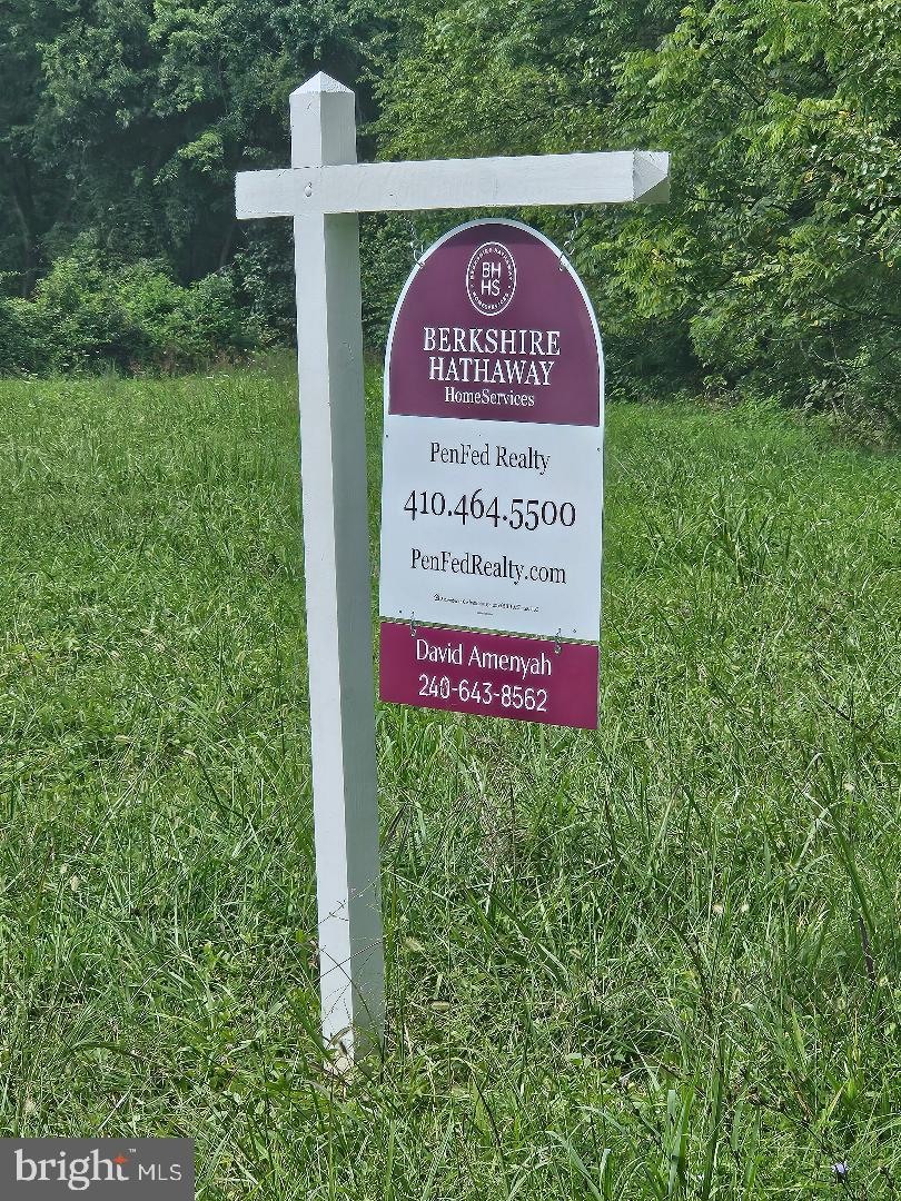 Johnsontown Road Chestertown, MD 21620 - Photo 7 of 14 a sign that is on a pole