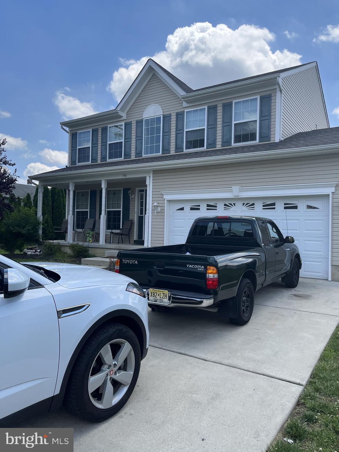 140 Kelly Driver Road Laurel Springs, NJ 08021 - Photo 2 of 19 a car parked in front of a house