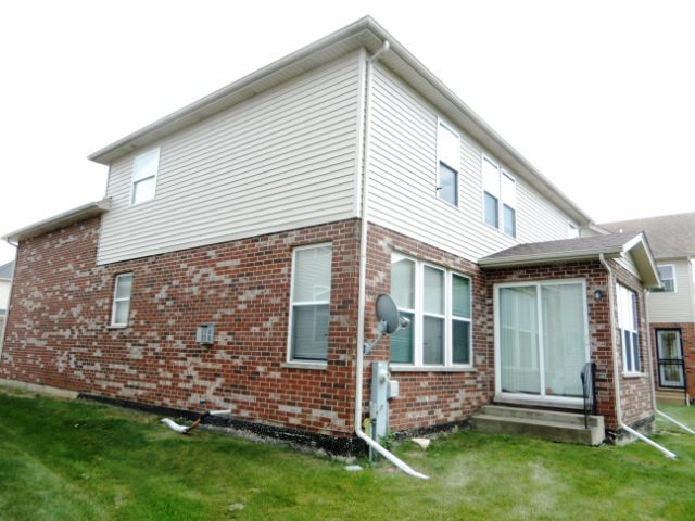82 Stephens Matteson, IL 60443 - Photo 4 of 9 a front view of a house with a garden
