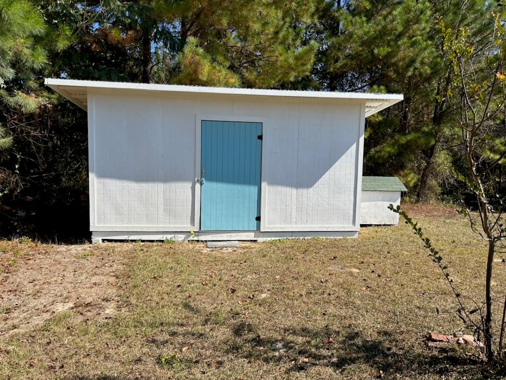 1300 Dr Brooks Road Box Springs, GA 31801 - Photo 4 of 16 a view of a house with a yard