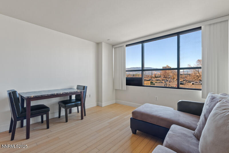 450 North Arlington Avenue, Unit 302 Reno, NV 89503 - Photo 10 of 21 a living room with furniture and a window
