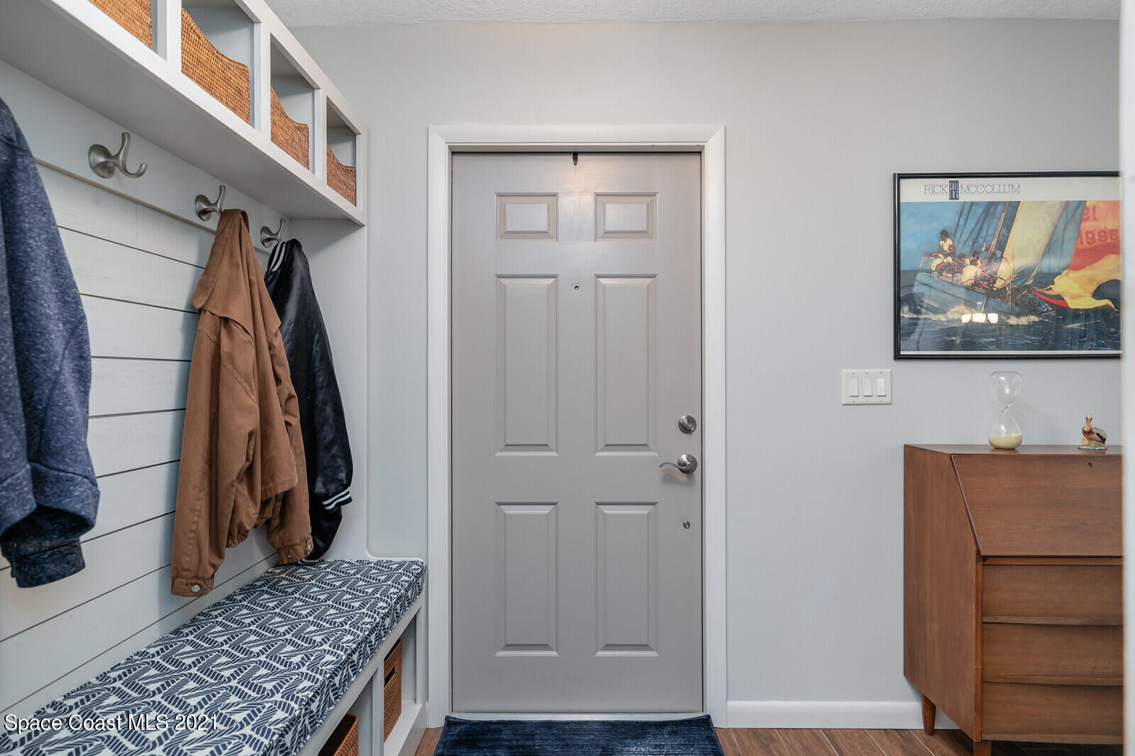 791 Montclair Road Northeast Palm Bay, FL 32905 - Photo 17 of 69 a view of walk in closet with clothes and shoes