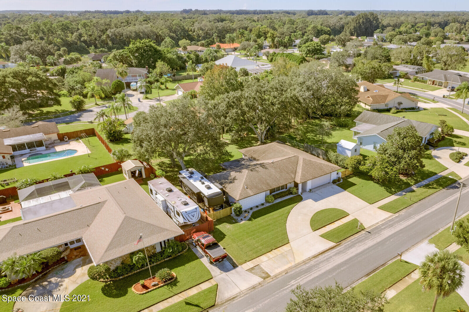 791 Montclair Road Northeast Palm Bay, FL 32905 - Photo 5 of 69 an aerial view of residential house with outdoor space