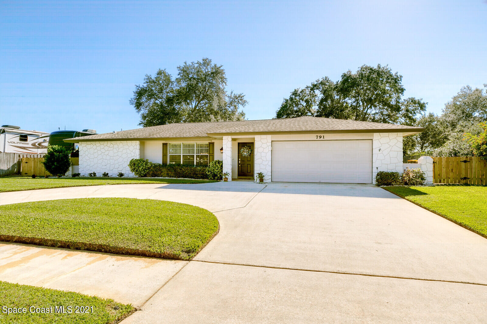 791 Montclair Road Northeast Palm Bay, FL 32905 - Photo 51 of 69 a view of house with swimming pool outdoor seating