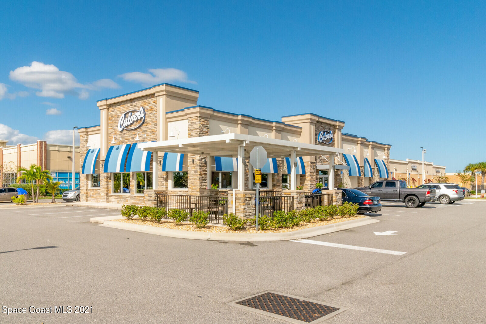 791 Montclair Road Northeast Palm Bay, FL 32905 - Photo 58 of 69 a view of a building with street