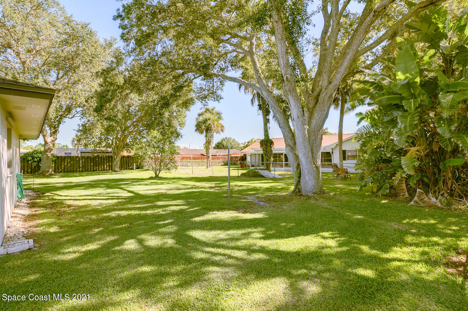 791 Montclair Road Northeast Palm Bay, FL 32905 - Photo 7 of 69 a view of a fountain in front of a house with a big yard
