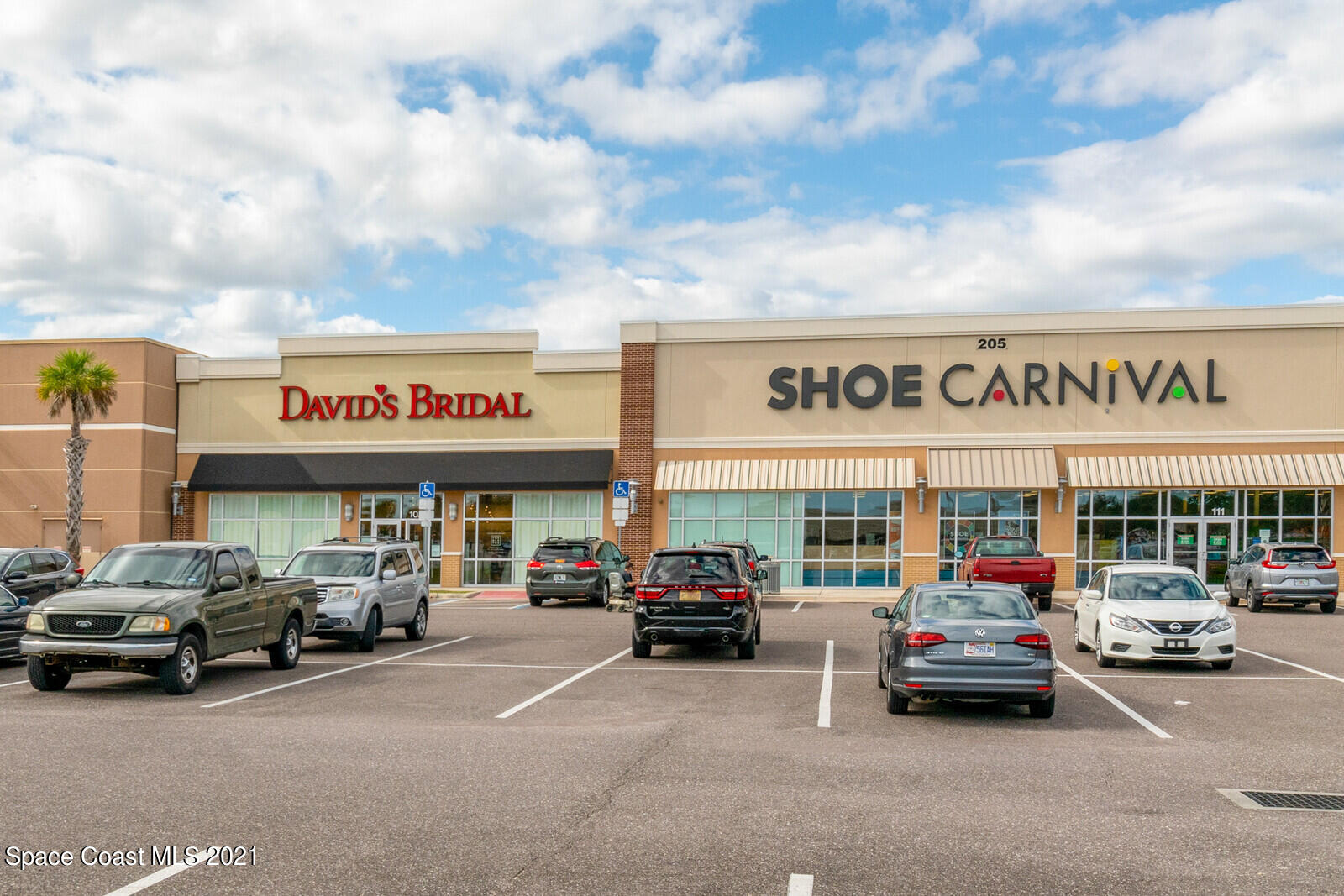 791 Montclair Road Northeast Palm Bay, FL 32905 - Photo 64 of 69 a car parked in front of a building
