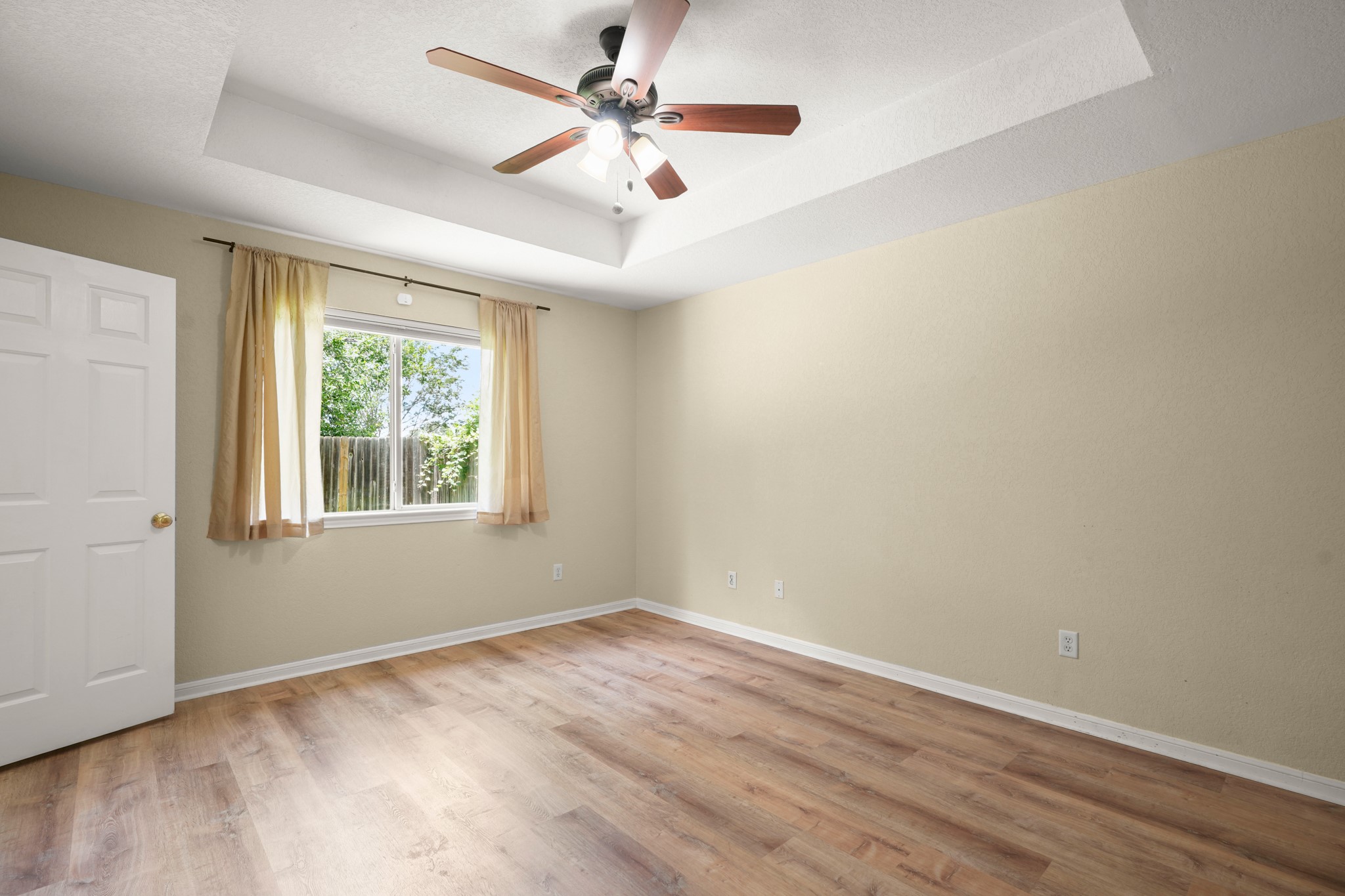 438 Katy Crossing Georgetown, TX 78626 - Photo 12 of 24 A versatile room featuring durable wood flooring and a refreshing ceiling fan with ample natural light.