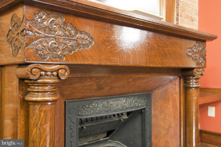 a close view of a fireplace in the room