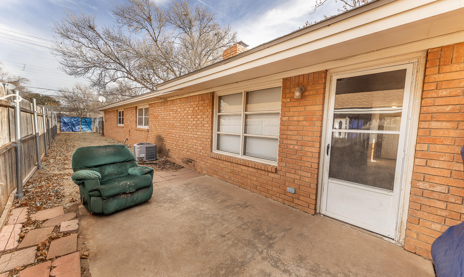 2410 33rd Street Lubbock, TX 79411 - Photo 12 of 14 a backyard of a house