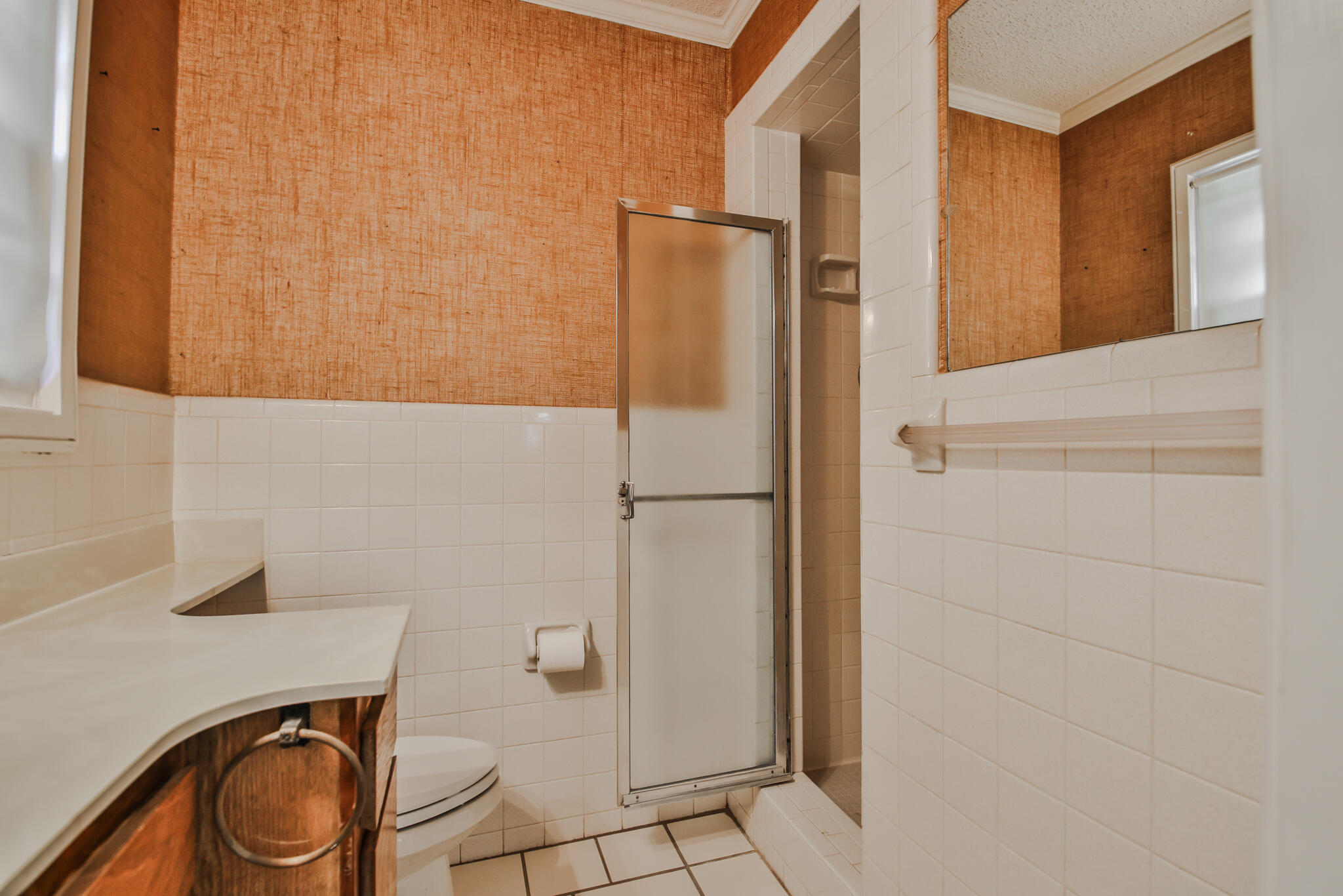 4315 47th Street Lubbock, TX 79413 - Photo 20 of 37 a bathroom with a sink a toilet and shower