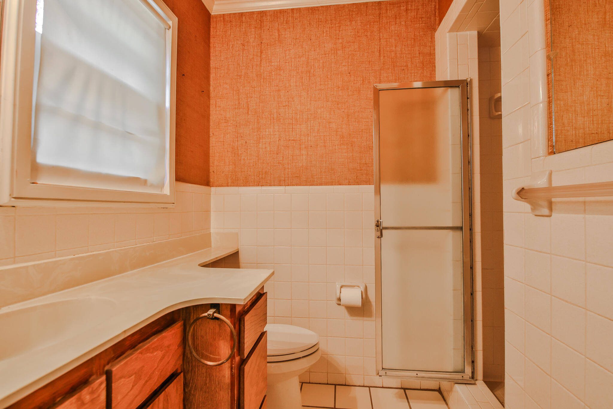 4315 47th Street Lubbock, TX 79413 - Photo 21 of 37 a bathroom with a sink and a shower