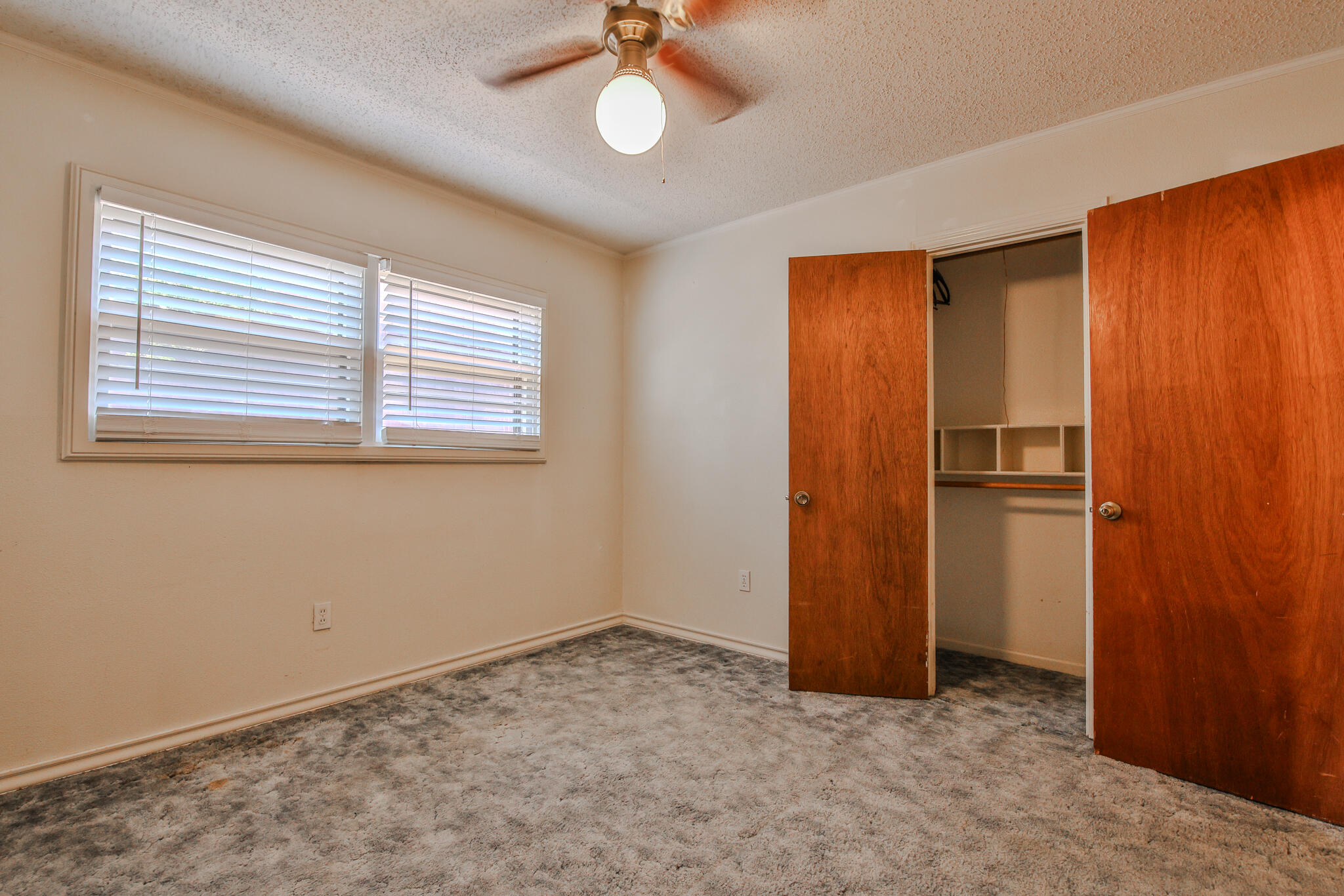 4315 47th Street Lubbock, TX 79413 - Photo 23 of 37 a view of an empty room with a window