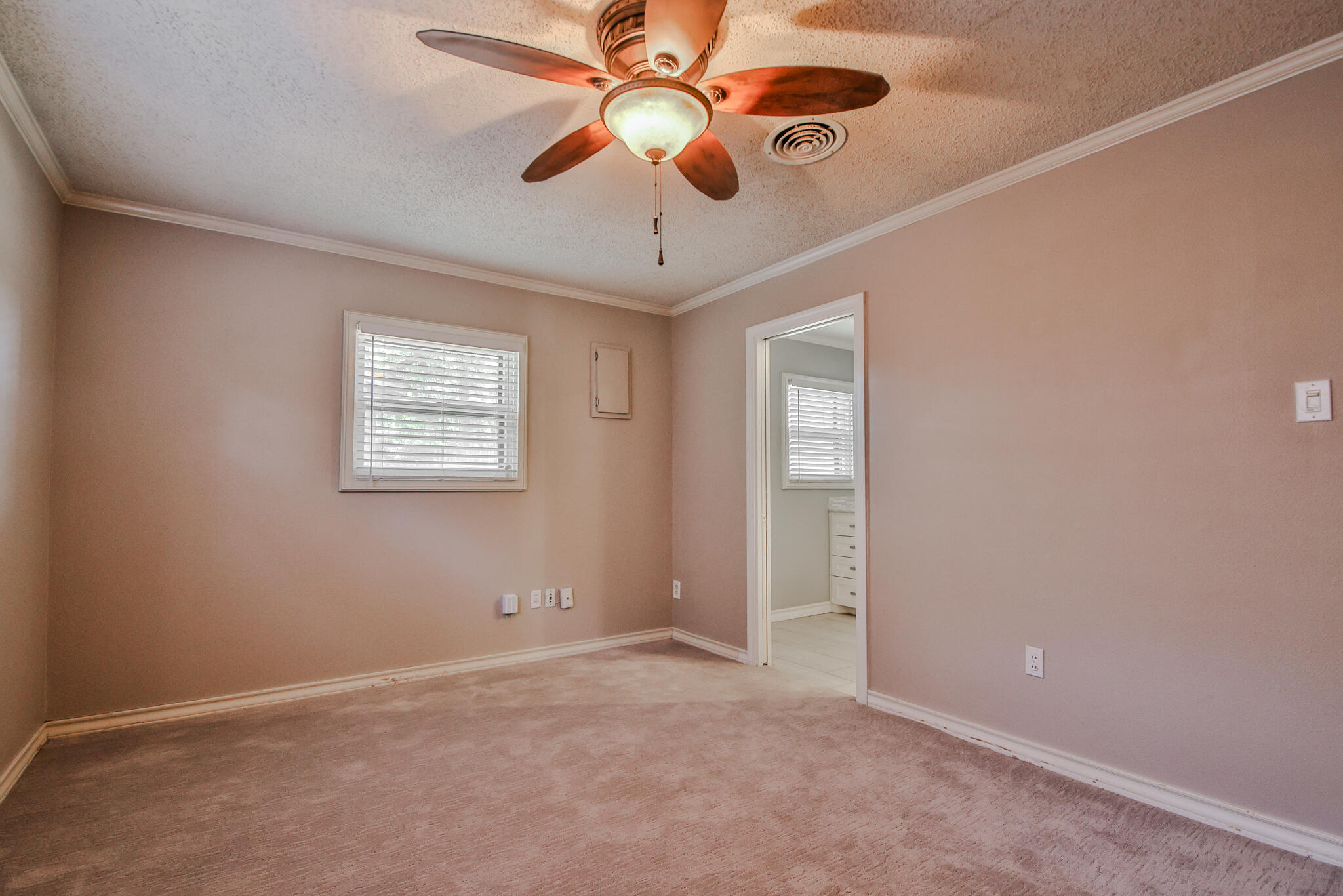 4315 47th Street Lubbock, TX 79413 - Photo 26 of 37 a view of an empty room with a window