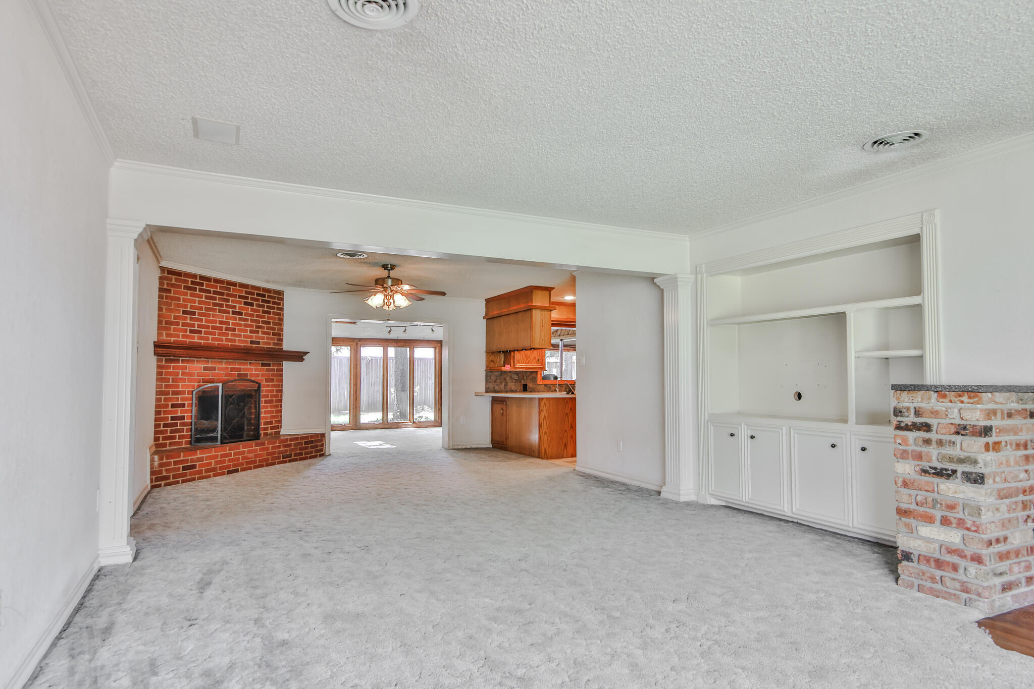 4315 47th Street Lubbock, TX 79413 - Photo 7 of 37 wooden floor and an empty room