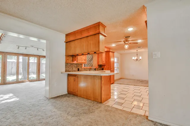 a big room with closet and windows