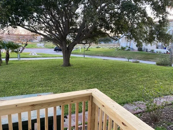 a view of backyard with green space