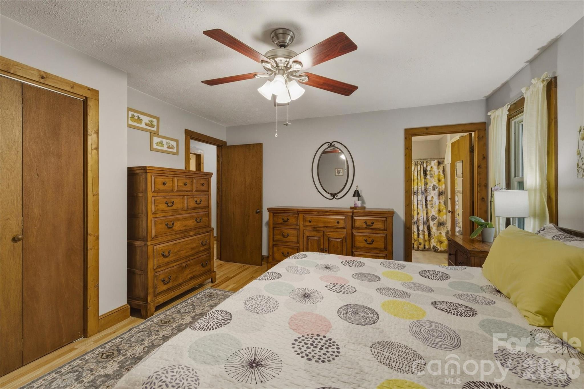 3432 Ridgewood Drive Morganton, NC 28655 - Photo 18 of 36 a bedroom with a bed dresser and a window