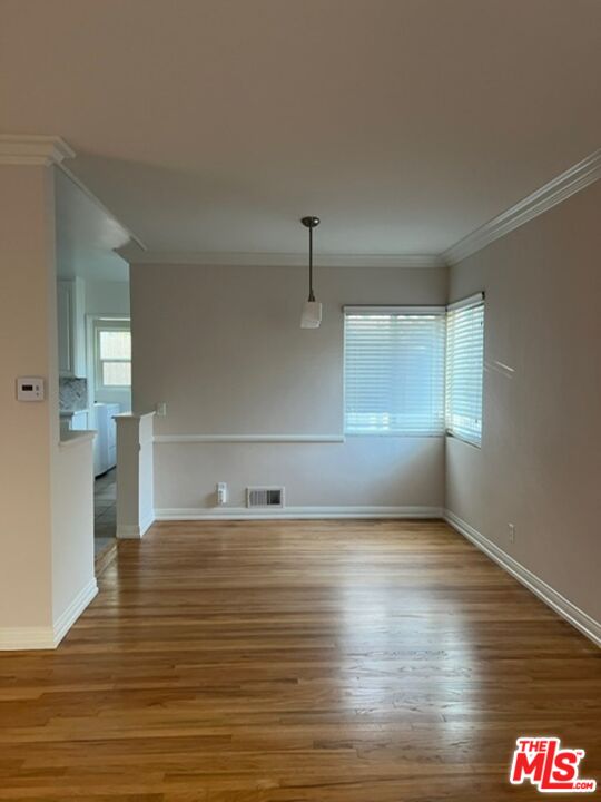 4164 Madison Avenue, Unit B Culver City, CA 90232 - Photo 4 of 21 a view of empty room with wooden floor