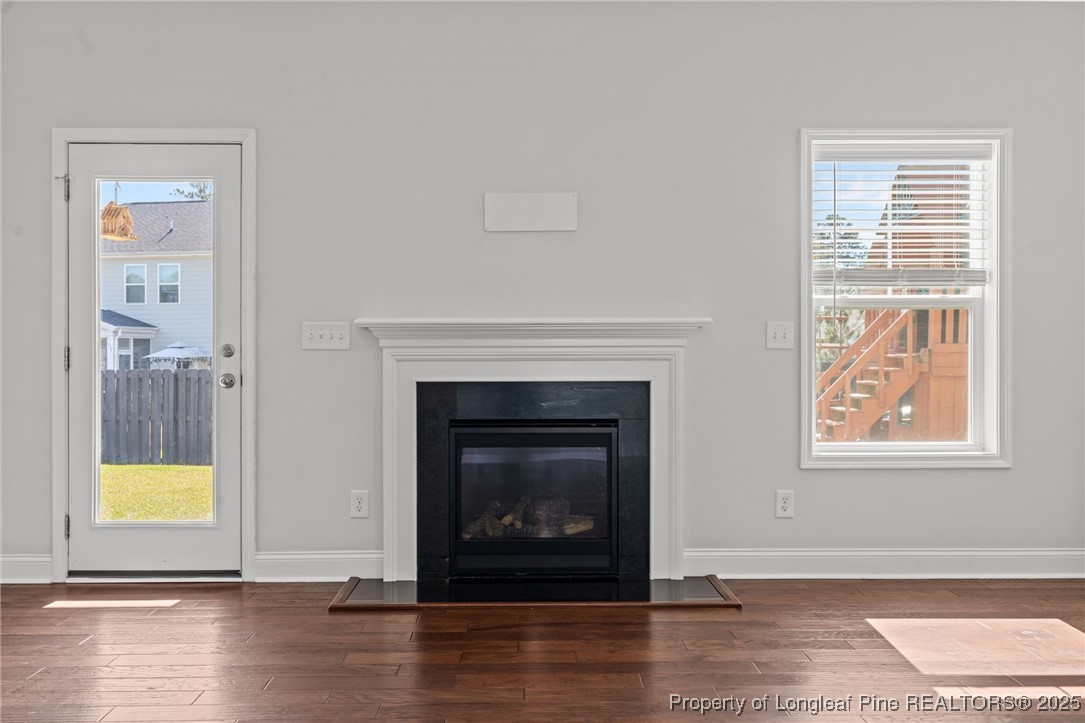 335 Parrish Lane Carthage, NC 28327 - Photo 19 of 50 a view of an empty room with window and fireplace