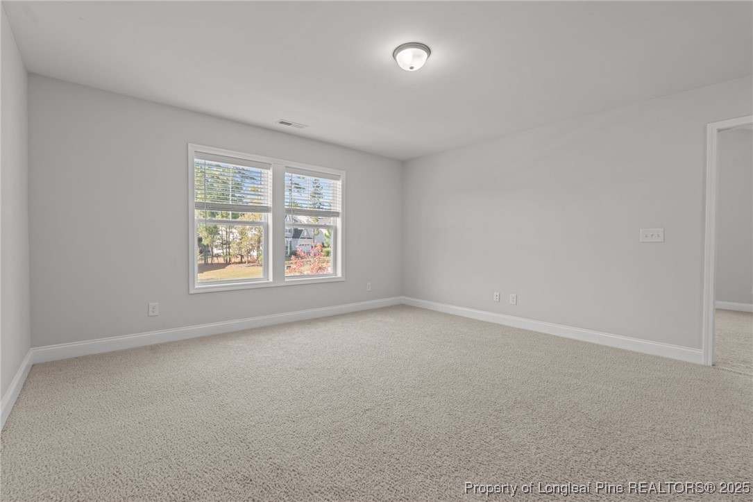335 Parrish Lane Carthage, NC 28327 - Photo 31 of 50 an empty room with windows
