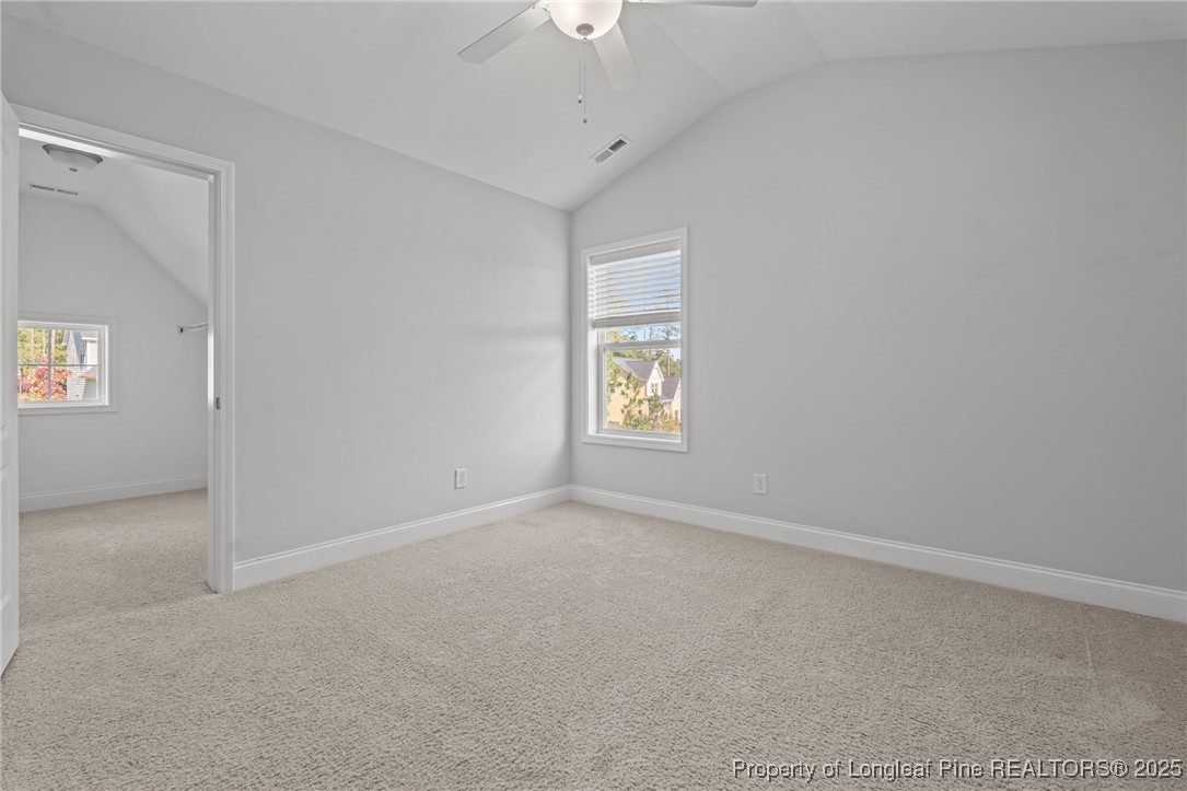 335 Parrish Lane Carthage, NC 28327 - Photo 34 of 50 an empty room with a window and a fan