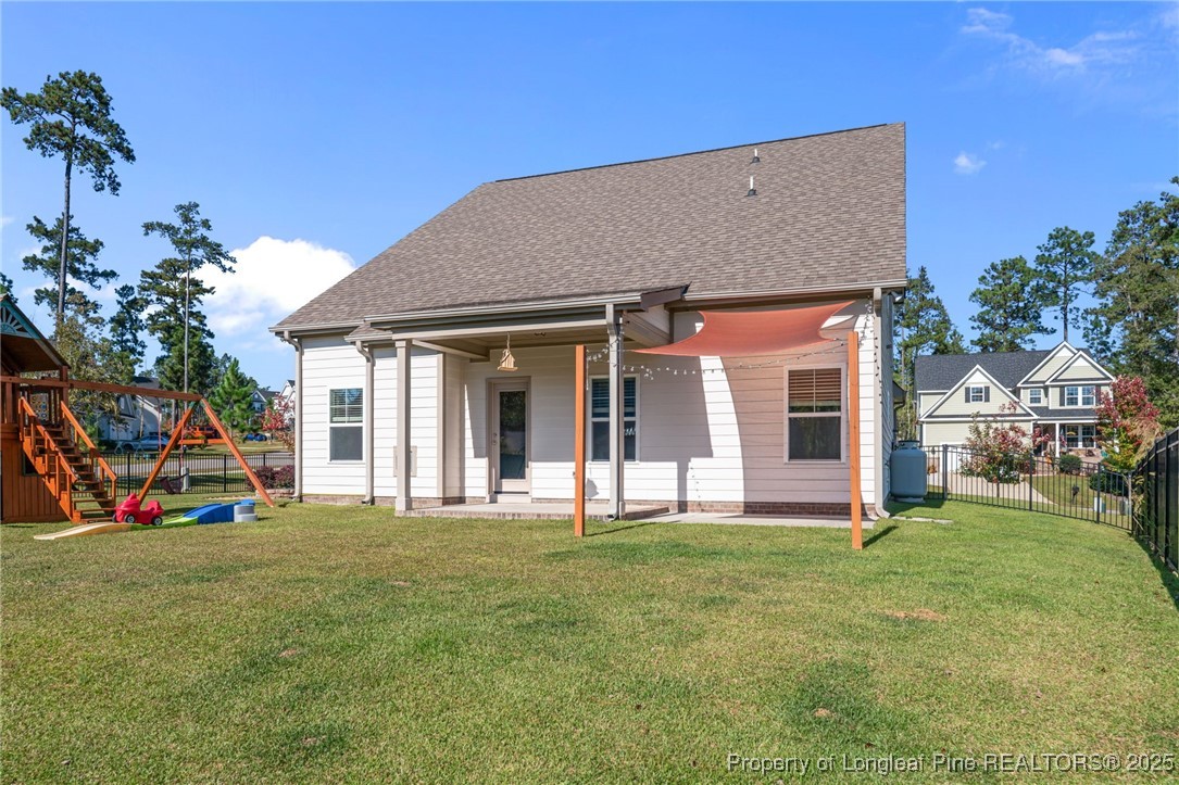 335 Parrish Lane Carthage, NC 28327 - Photo 42 of 50 a front view of a house with a yard