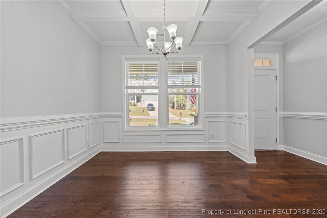 335 Parrish Lane Carthage, NC 28327 - Photo 10 of 50 an empty room with wooden floor and windows