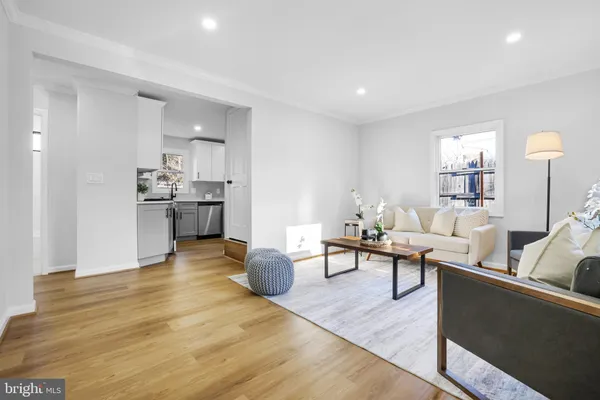 a living room with furniture and a table
