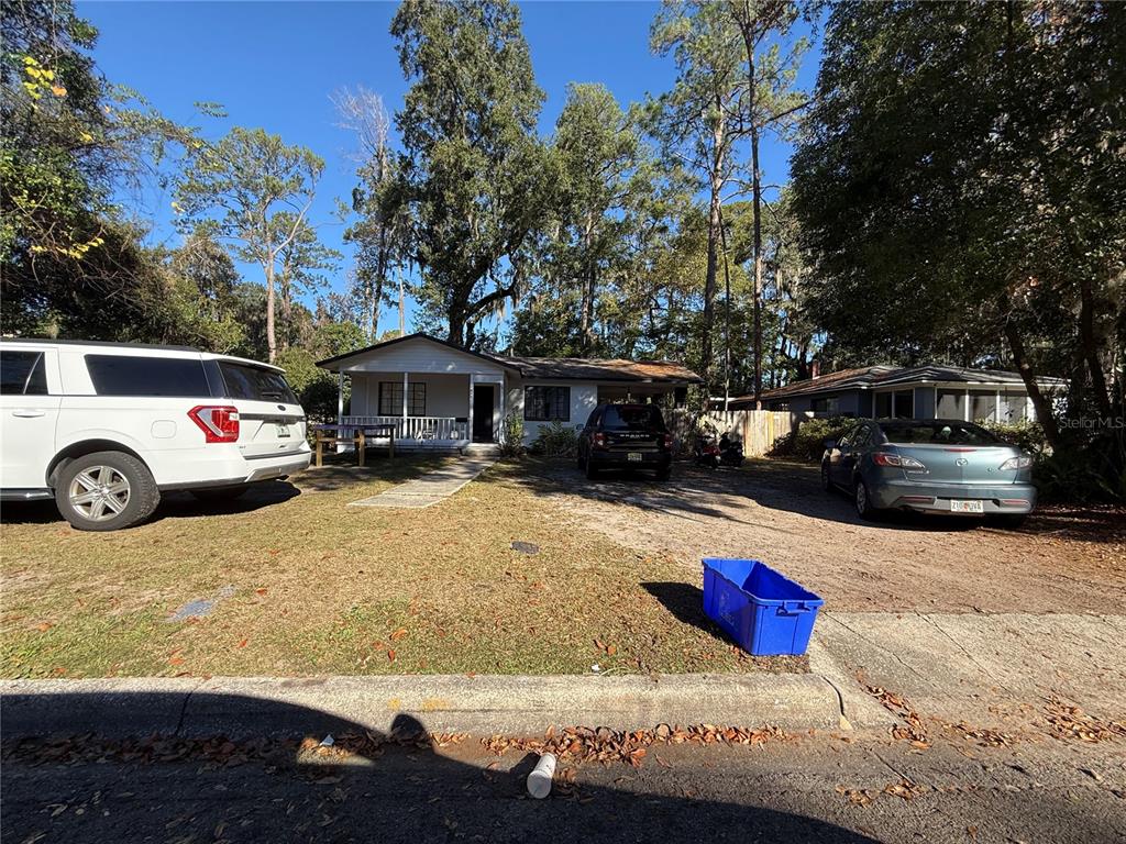 1610 Northwest 6th Avenue Gainesville, FL 32603 - Photo 1 of 1 a view of street with parked cars