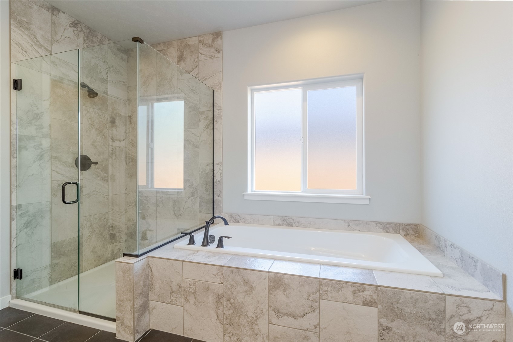 862 Boulder Street Walla Walla, WA 99362 - Photo 15 of 38 a bathroom with a tub sink and shower