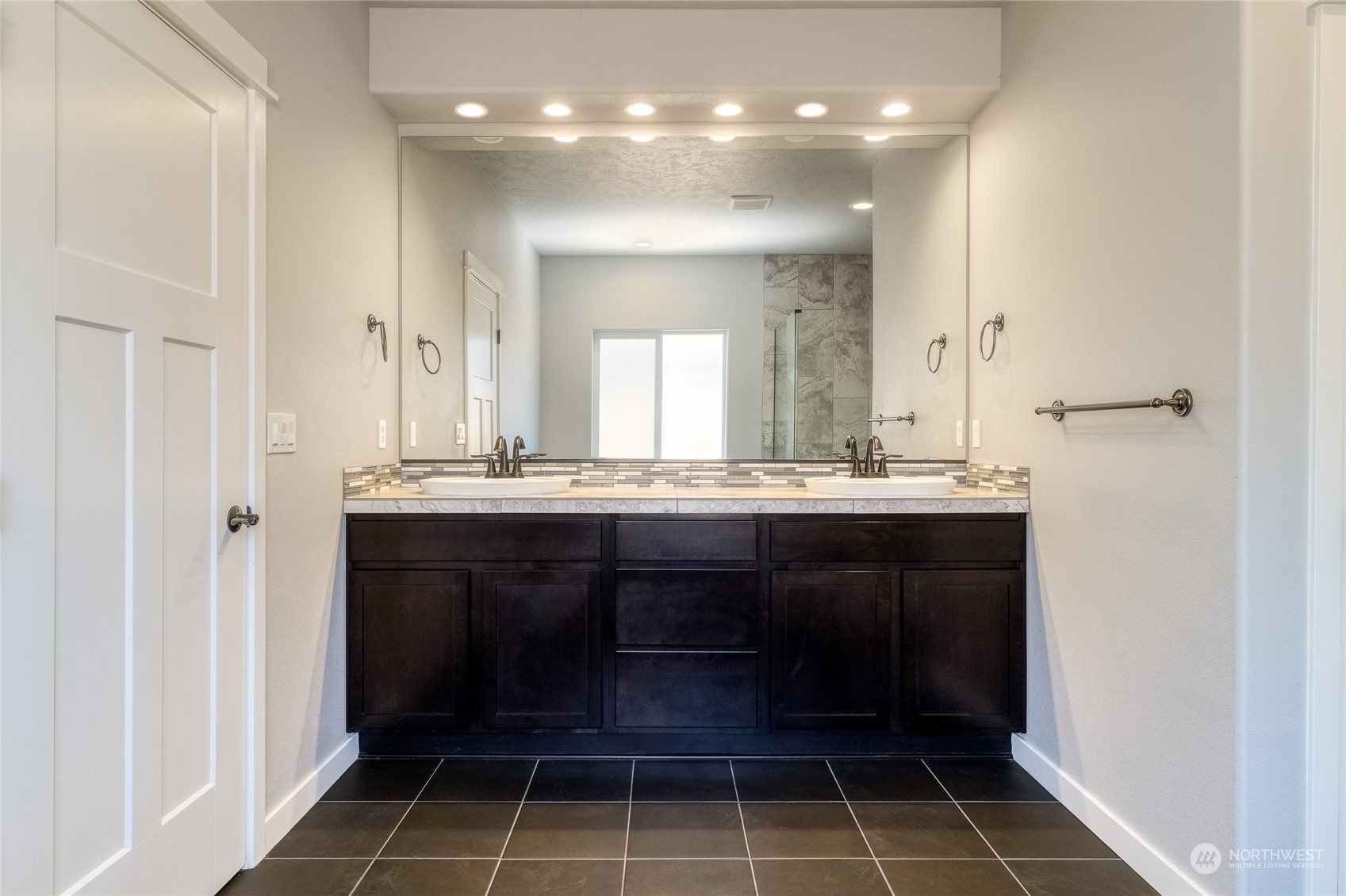 862 Boulder Street Walla Walla, WA 99362 - Photo 16 of 38 a bathroom with a sink and a mirror