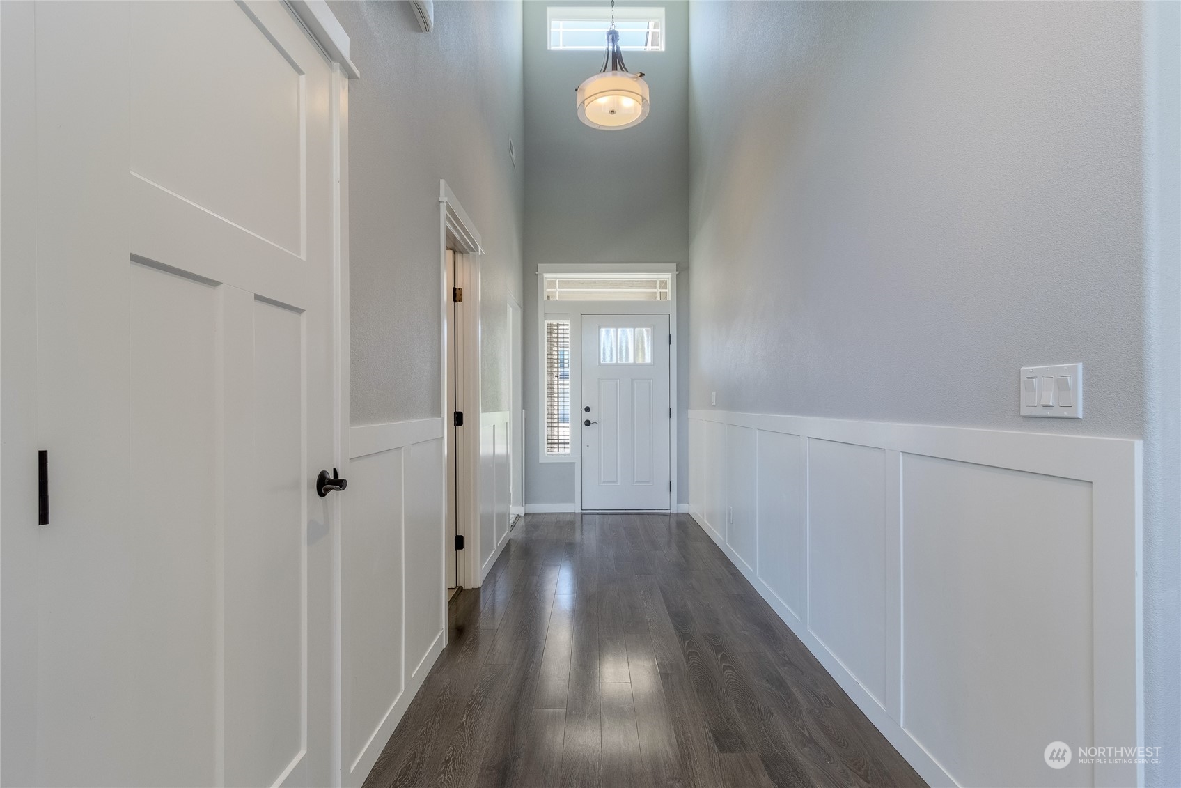 862 Boulder Street Walla Walla, WA 99362 - Photo 2 of 38 a view of a hallway with wooden floor
