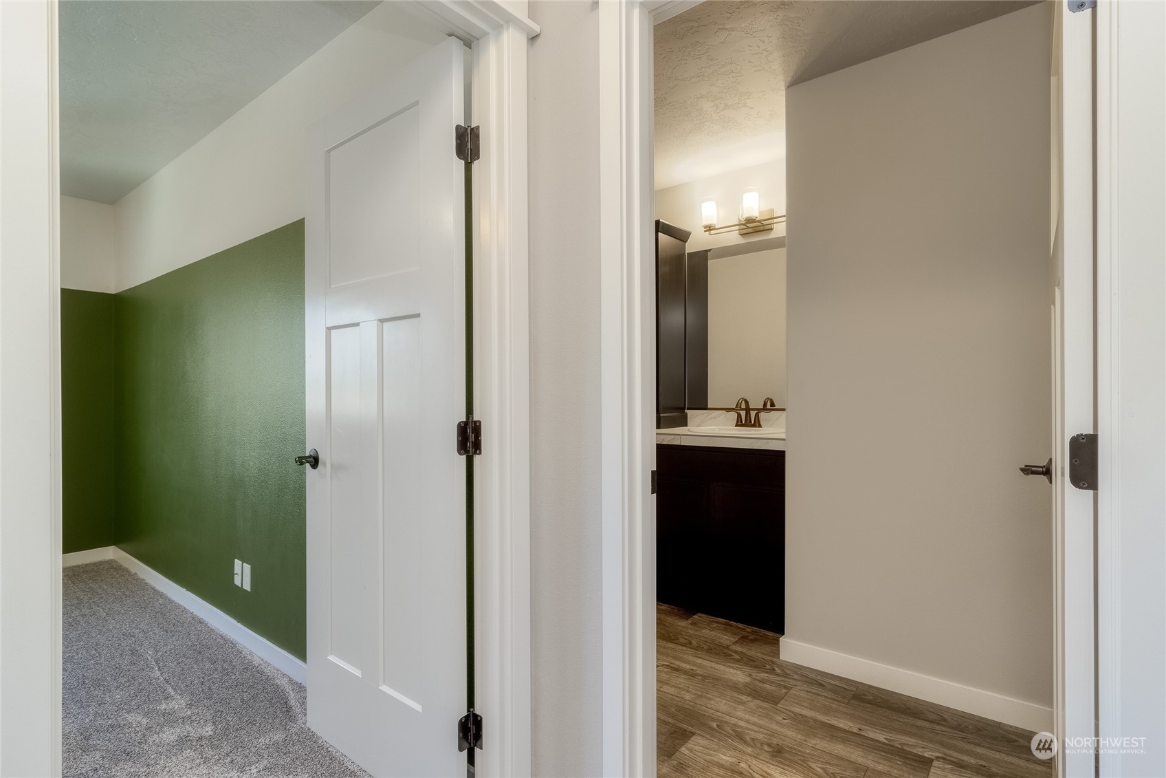 862 Boulder Street Walla Walla, WA 99362 - Photo 21 of 38 a view of a hallway with wooden floor and closet