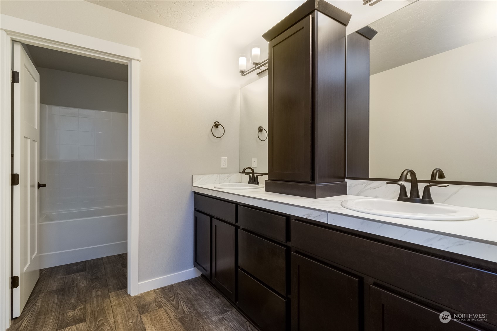 862 Boulder Street Walla Walla, WA 99362 - Photo 23 of 38 a bathroom with a double vanity sink and a mirror