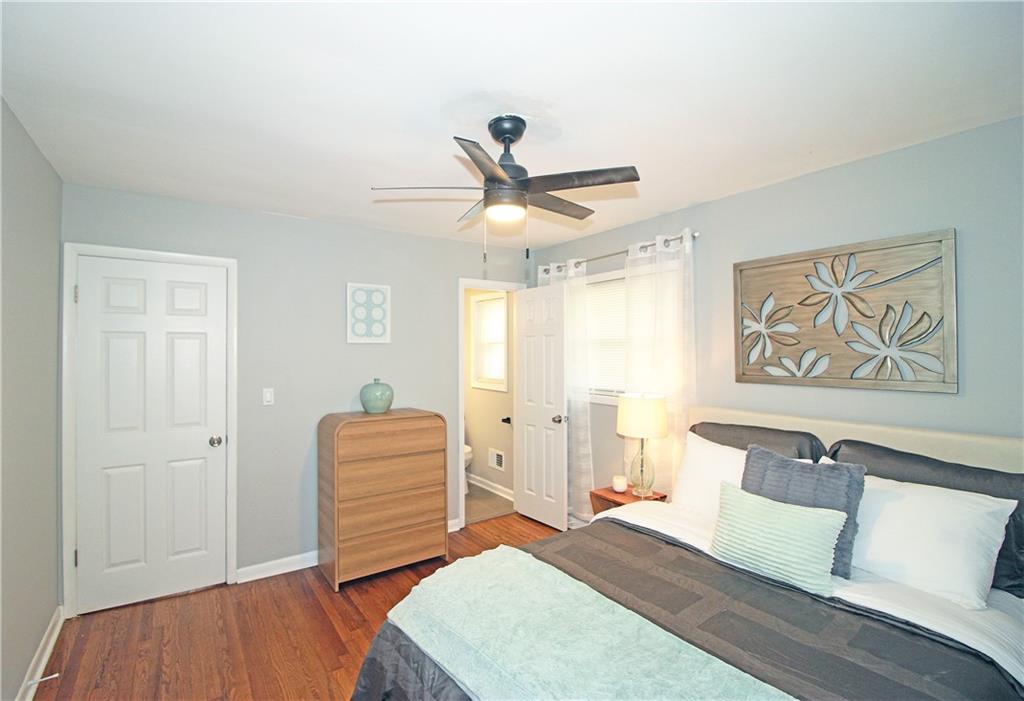 2450 Elkhorn Drive Decatur, GA 30034 - Photo 13 of 32 a bedroom with a bed and a dresser